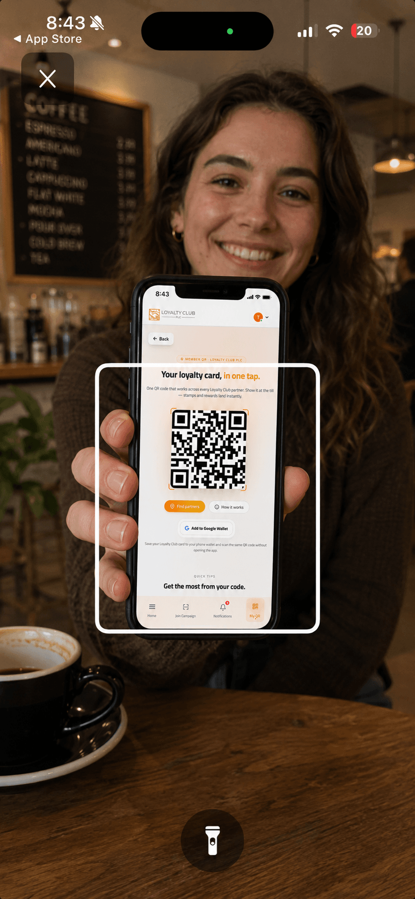 Mobile app stamp and reward screen showing campaign progress on a phone.